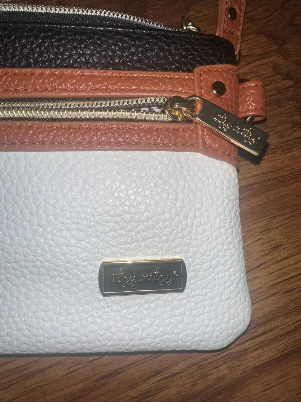 Itzy Ritzy Tricolor Crossbody Bag in White, Black & Tan